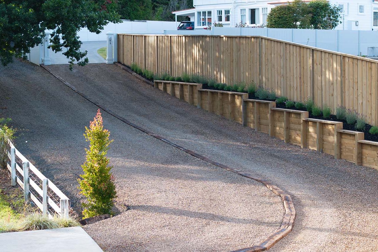 Sloped gravel driveway stabilised with PebbleLock