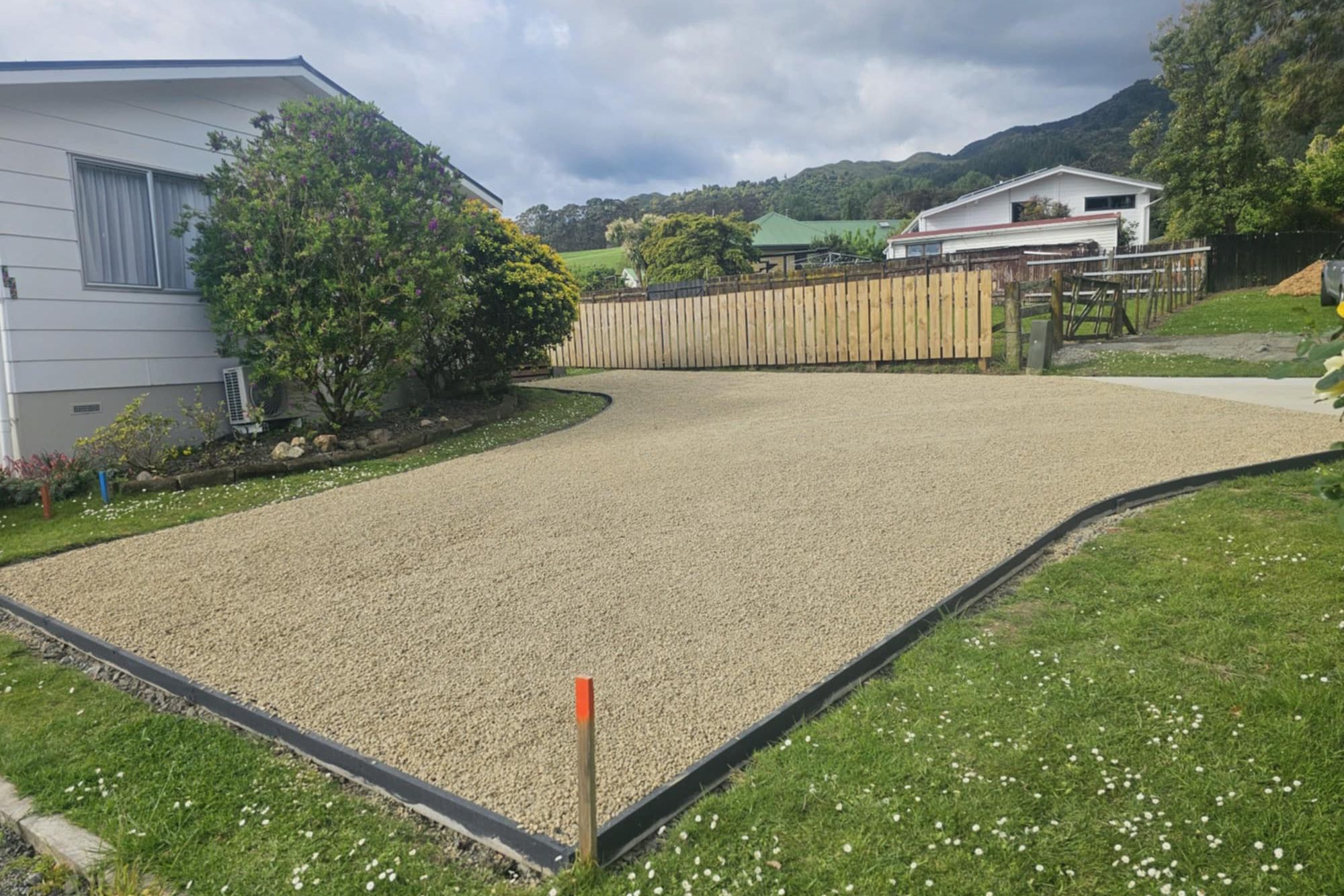 Pebble driveway project built with Strol paving