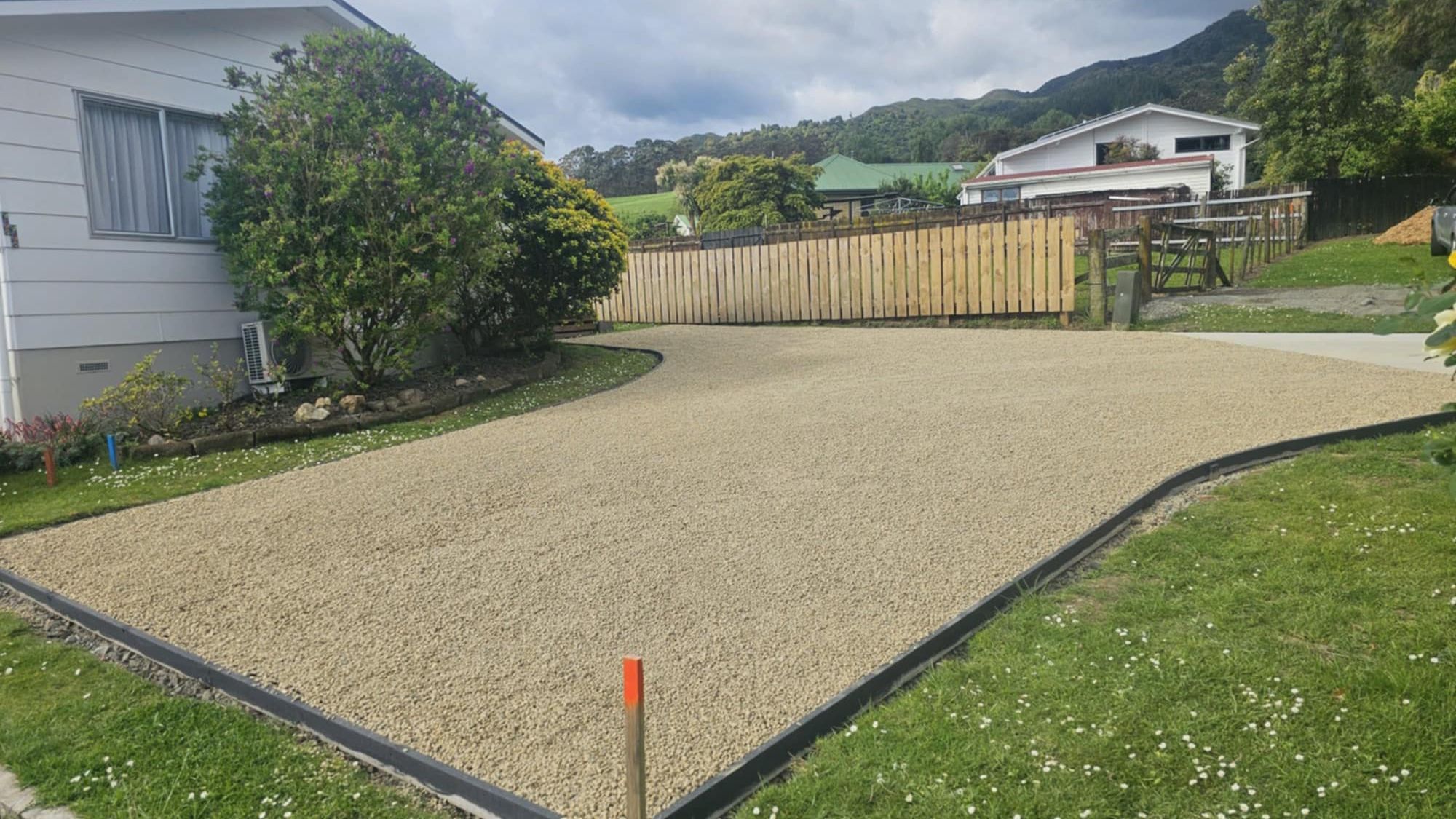 Pebble driveway project built with Strol paving