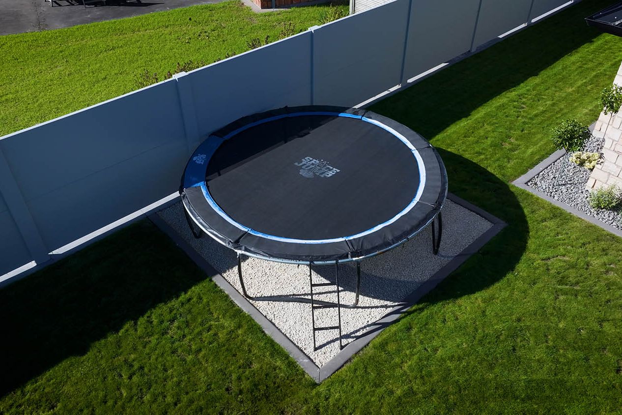 Trampoline on a level PebbleLock gravel base