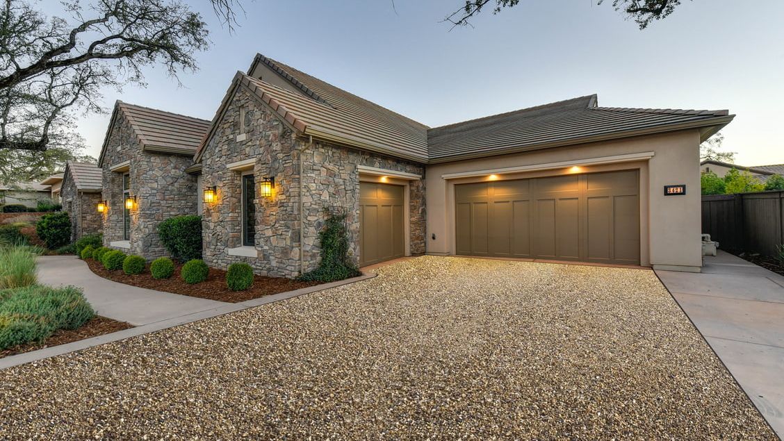Pebbled driveway built with permeable pavers