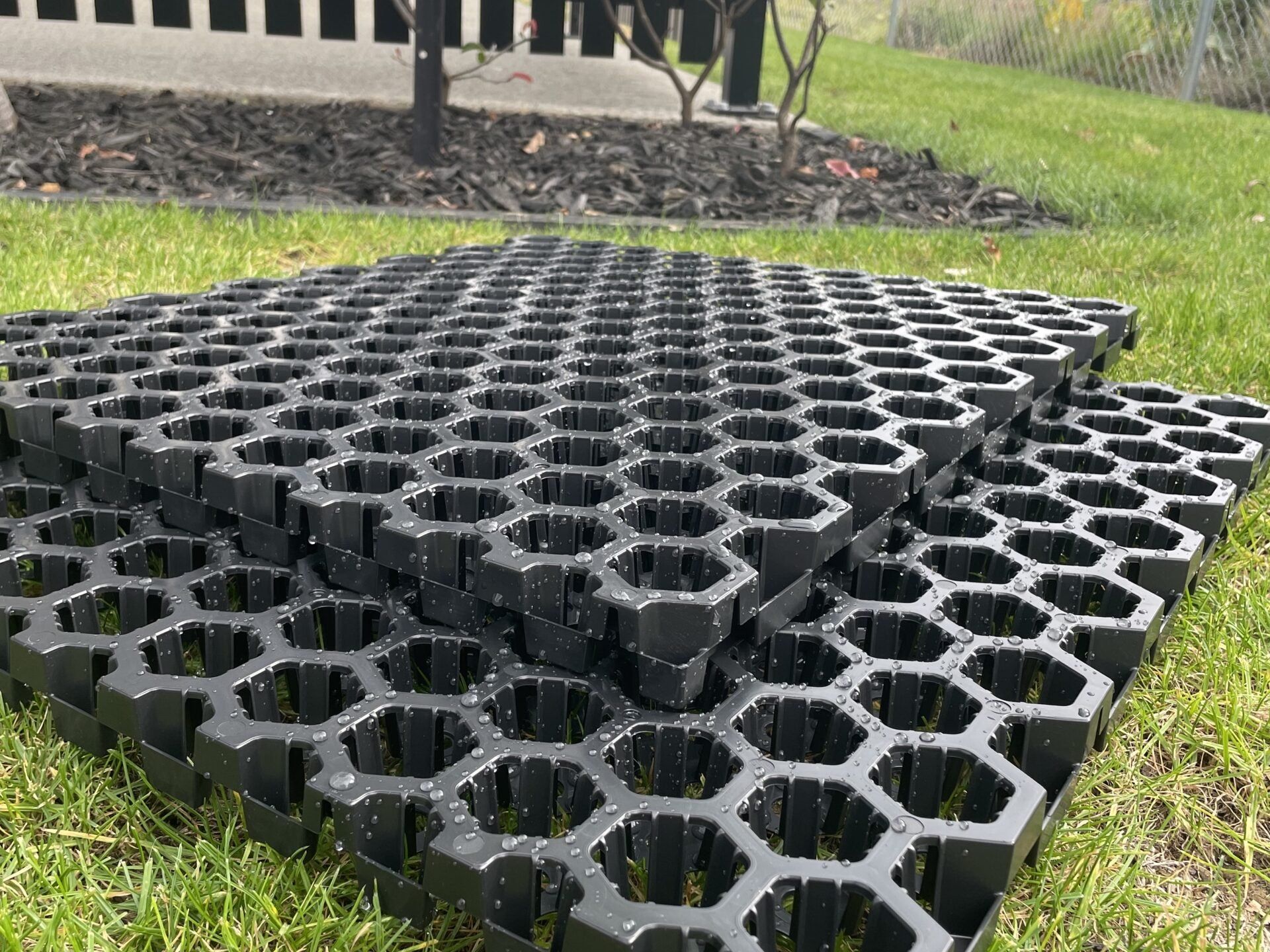 Stacked SureSoak drainage cells on a lawn