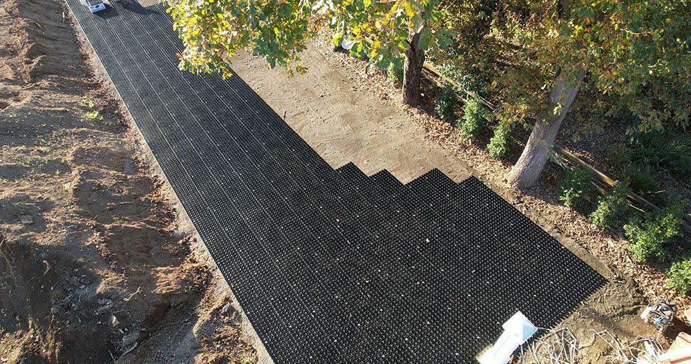 Gravel driveway stabilised with PebbleLock