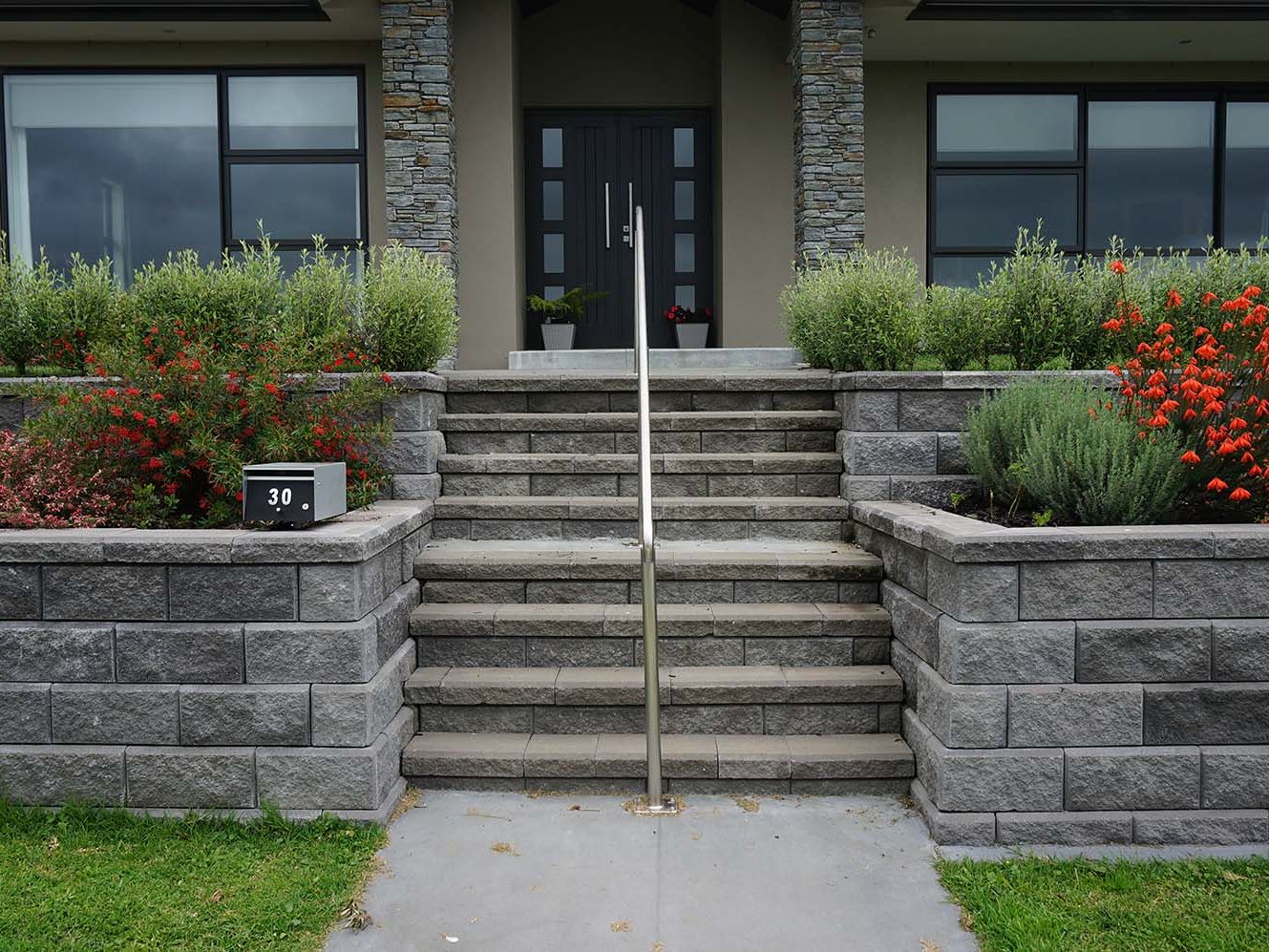 StrataGrid installed behind a home retaining wall