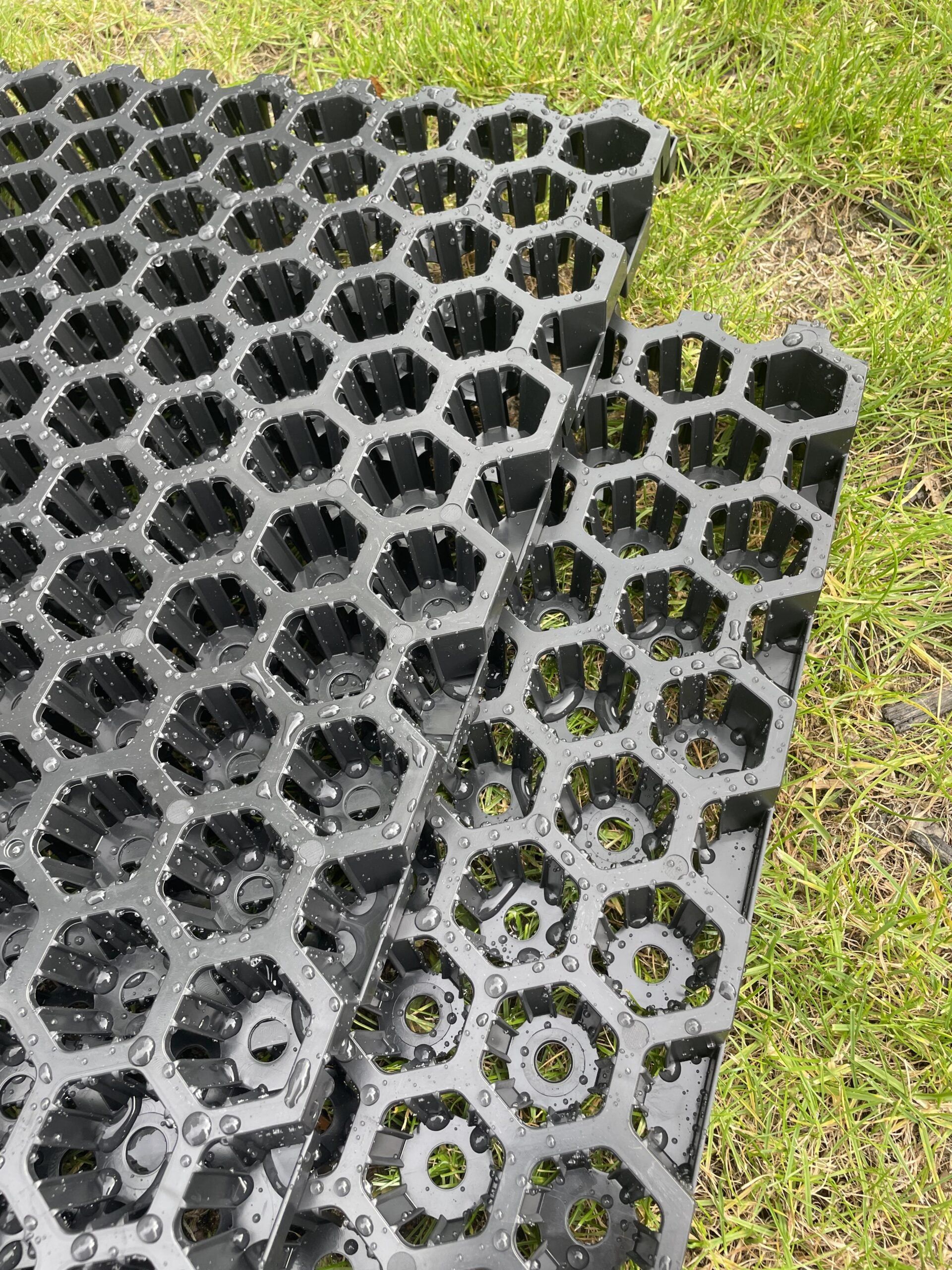Close-up of SureSoak drainage cell panels on grass