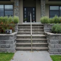 StrataGrid installed behind a home retaining wall