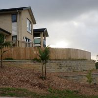 Retaining wall reinforced with StrataGrid