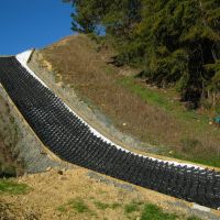 StrataWeb geocell filled on an embankment