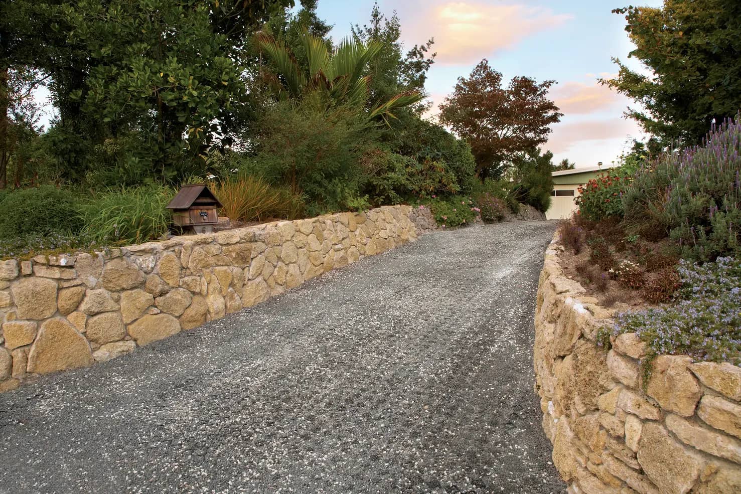 Building a gravel driveway on sloped land A complete guide Strol